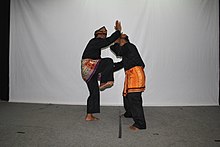 Gorontaloan men practicing Langga, a traditional martial arts. 2 Beladiri Langga Gorontalo.JPG