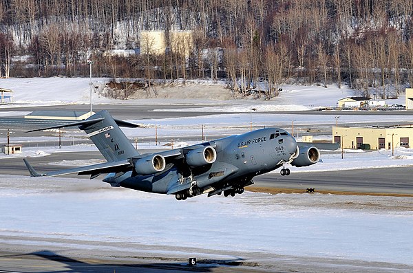 A 517th Airlift Squadron C-17 Globemaster III taking off from Elmendorf Field