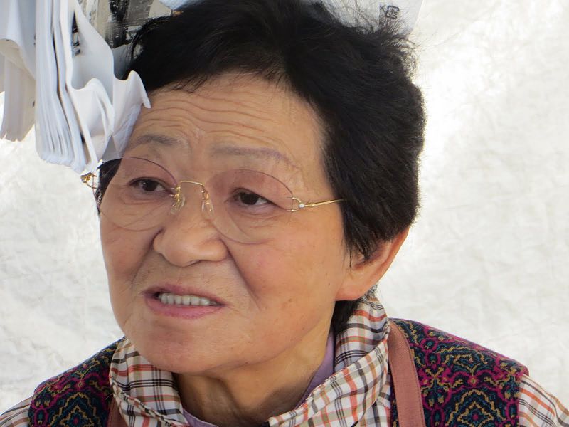 File:A sales lady,Takayama market2 Japan.JPG