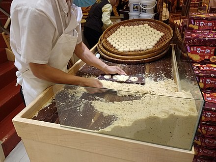 Macau's famous almond cookies, being made by hand in the historic center of the city