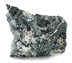 Hopeanvaaleita juonteita ja täpliä altaiittia kivessä.(Hilltop Mine, Organ District, Doña Anan piirikunta, New Mexico) (Koko:  3.5 x 2.9 x 1.9 cm)