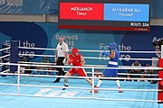 Deutsch: Boxen bei den Olympischen Jugendspielen 2018 Tag 12, 18. Oktober 2018 - Kampf um die Bronzemedaille im Fliegengewicht Mädchen – Timur Merjanow (Usbekistan, rot) schlägt Youssef Ali Karar Ali (Ägypten, blau) 5-0; Ringrichter ist Antonín Gaspar (Tschechien). English: Boxing at the 2018 Summer Youth Olympics on 18 October 2018 – Boy's heavyweight Bronze Medal Bout - Timur Merjanov (Uzbekistan, red) beats Youssef Ali Karar Ali (Egypt, blue) 5-0; Referee is Antonín Gaspar (Czech Republic). Español: Boxeo en los Juegos Olímpicos Juveniles de Verano de 2018 en 18 de octubre de 2018 - Medalla de bronce de peso pesado del muchacho: Timur Merjanov (Uzbekistán, roja) le gana a Youssef Ali Karar Ali (Egipto, azul) 5-0; El árbitro es Antonín Gaspar (Republica checa).