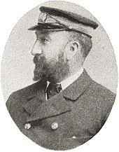 Gravure d'un capitaine portant la barbe et une casquette, vu de profil.