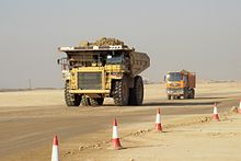 A Caterpillar 777D followed by a conventionally sized dump truck Caterpillar 777D-II.jpg