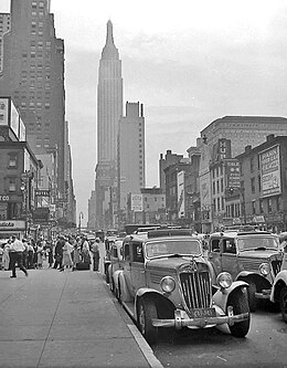 Checker Model Y taxicabs in New York City (1938) Checker cabs NYC 1938-2 (2248870404).jpg