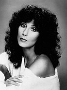 Black-and-white publicity photo of Cher circa the 1970s.
