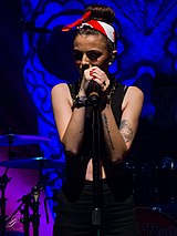 Lloyd performing in 2013 on her I Wish Tour Cher Lloyd (23483517034).jpg