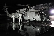 U.S. Navy humanitarian flight undergoes radioactive decontamination ChopperDecon2011.jpg