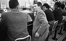 Additional image of Civil Rights protestors executing a sit-in at a Woolworth's in Durham, North Carolina on February 10th of 1960. Civil Rights protesters and Woolworth's Sit-In, Durham, NC, 10 February 1960. From the N&O Negative Collection, State Archives of North Carolina, Raleigh, NC. Photos taken by The News & (24413211092).jpg