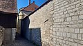 Train of the city wall and remnants of a fortified tower