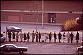 "DISCIPLINED_RIDERS_QUEUE_UP_FOR_EARLY_MORNING_EXPRESS_BUS_FROM_MONTGOMERY_MALL_(MD_SHOPPING_CENTER)_TO_WASHINGTON,_DC_-_NARA_-_546590.jpg" by User:US National Archives bot