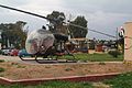 ES 722 Bell OH-13H preserved on the gate at Megara..jpg