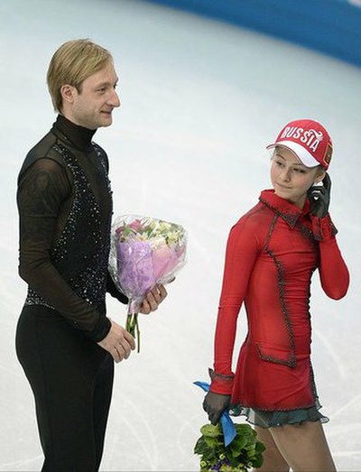 Lipnitskaya at the 2014 Olympics Team event with Evgeni Plushenko