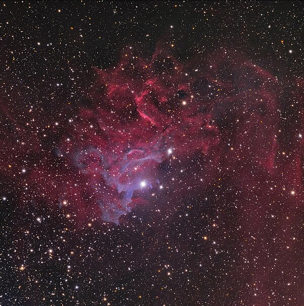 The Flaming Star Nebula (IC 405), and its neighbor IC 410, along with AE Aurigae, which illuminates the nebula.