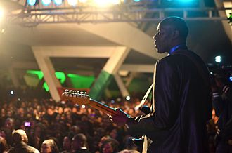 Jimi Mbaye performing live Gig.jpg