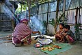 Grandmother making flapjacks