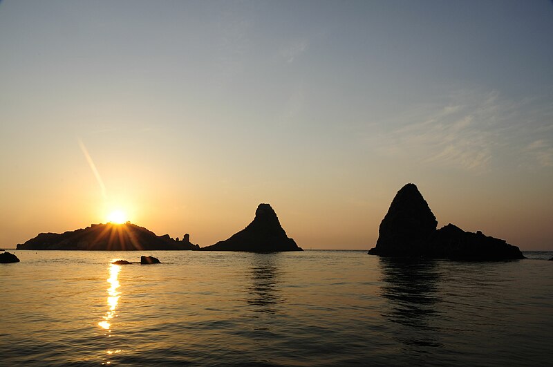 File:Islands of the Cyclops at Dawn Sicily Italy - Creative Commons by gnuckx (5040721912).jpg