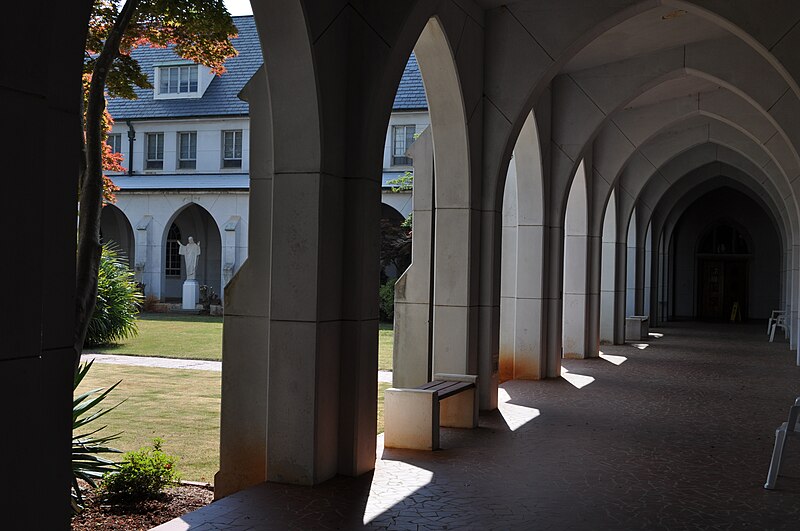 File:Jesus statue in the cloister garden and walkway.jpg