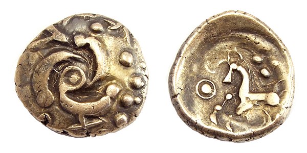 Gold stater of the Eburones. Triskele on the obverse, Celticized horse on the reverse.