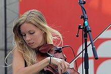 Kendel Carson plays on the CBC Plaza in Vancouver