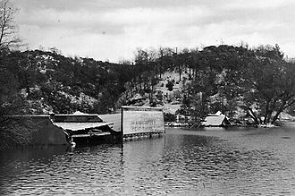 The old mining town of Kennett, being inundated by the rising waters of Shasta Lake circa 1944 Kennett-california-shasta.jpg