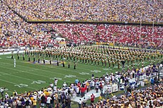 Led by the drum major, the LSU band takes the field for its pregame show. LSUbandpregame.jpg