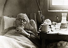 Norwegian resistance fighter Lauritz Sand recovering after his release from the Gestapo, May 1945 Lauritz Sand recovering after his release, May 1945.jpg