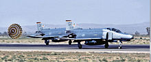 20th Fighter Squadron Phantoms rolling out at George AFB, California, 1992 McDonnell Douglas F-4E-63-MC Phantom 75-0633 and 75-0636.jpg