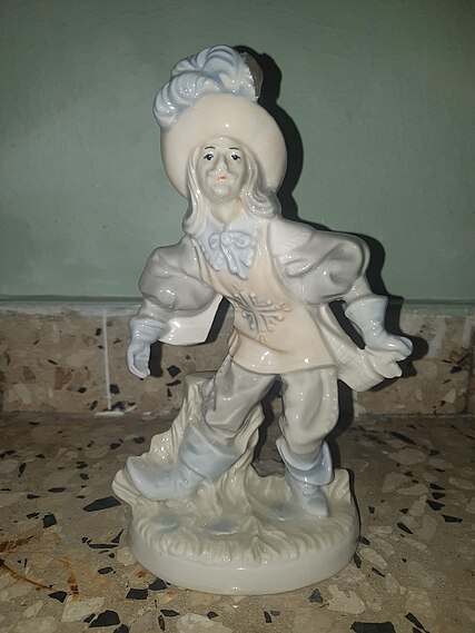 A Musketeer figurine.