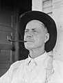 Dorothea Lange. O.O. Mills, United States Country Postmaster at Carey, Texas. Small Texas town in area being depopulated by tractor farming. “The tractors are keeping our families from making a living.” June 1938.