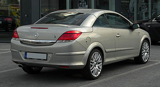 Opel Astra Twintop with a three-part folding metal roof which sits in the upper half of the boot space, leaving considerable luggage space below it. Sold from 2005 to 2012.
