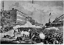 The Orange riot of 1871 as depicted in Frank Leslie's Illustrated Newspaper. The view is at 25th Street in Manhattan looking south down Eighth Avenue. Orange Riot 1871 crop.jpg