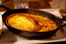 A Quenelle with nantua sauce Quenelle de brochet sauce Nantua.jpg