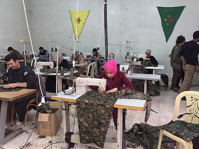 Rojava's support efforts for workers to form cooperatives is exemplified in this sewing cooperative.