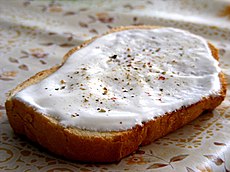 Slice of toast with sour cream and pepper.jpg