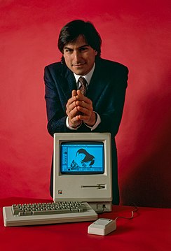 Steve Jobs and Macintosh computer, January 1984, by Bernard Gotfryd - edited