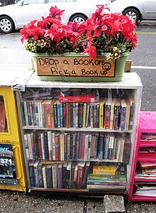 A "street book exchange" in Washington Heights, Manhattan. Street book exchange 181st Street and Fort Washington Ave Hudson Heights.jpg