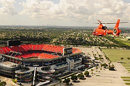 A U.S. Coast Guard MH-65 Dolphin helicopter flies over the stadium, August 2011 Sun Life Stadium Coast Guard flyover.JPG