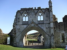 Kirkham Priory gatehouse ruins. The armorials of various benefactors are visible sculpted on stone escutcheons The Gatehouse of Kirkham Priory - geograph.org.uk - 1226696.jpg