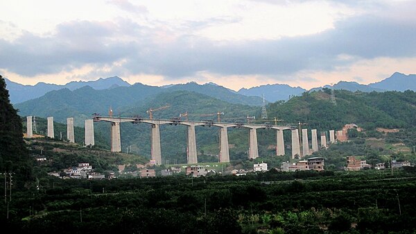 Construction progress on the Guiyang–Guangzhou high-speed railway, bridge over the Xingping Reservoir in Xingping district of Yangshuo county, Guilin,