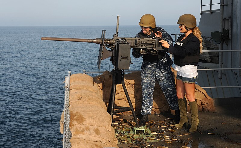 File:US Navy 101001-N-6362C-046 Chief Gunner's Mate Keith McGinley prepares singer-actress Jessica Simpson for a .50-caliber gun shoot during a USO and.jpg