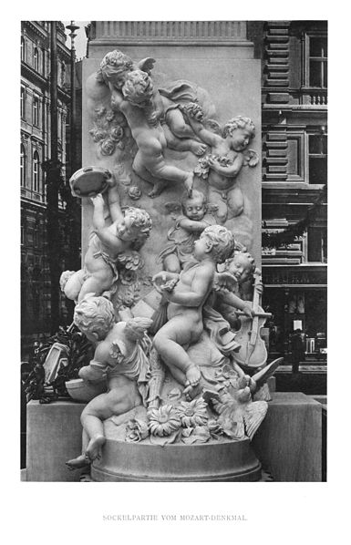 File:Victor Tilgner - 06 - Sockelpartie vom Mozartdenkmal.jpg
