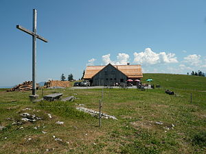 The Weißenfluhalpe with the alpine cross