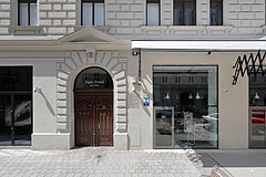 Entrance to Sigmund Freud's former home and workplace at Berggasse 19 in Vienna, one of the settings for Tallis's novels and now used as the Sigmund Freud Museum.