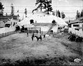 Wild West Show practicing in corral behind the Gold Camps of Alaska exhibit, Pay Streak, Alaska Yukon Pacific Exposition (AYP 599).jpeg