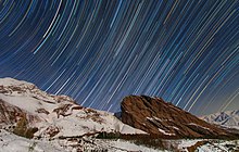 Star trail over the rocky mountain in Alamut, Qazvin, Iran