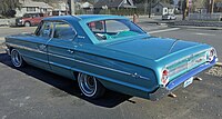 1964 Ford Galaxie 500 sedan, rear left (John Lloyd).jpg