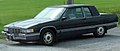 1991-1992 Cadillac Fleetwood Coupe, front left view