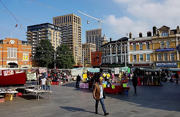 Beresford Square market with Royal Arsenal Gatehouse (left) and Crossrail development in the background