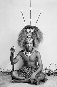 Young man dressed as a manaia, the son of a Samoan chief, in ceremonial attire including an elaborate headdress (tuiga), c. 1890-1910. (photo by Thomas Andrew) A Manaia, son of a Samoan matai photo Andrew.Thomas.jpg